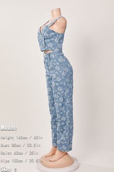 This Pansy Denim Pant Set is a must-have addition to your wardrobe. It's made of quality denim fabric that ensures comfort and durability. It features a unique design that makes you stand out from the crowd. Style it with your favorite accessories for a trendy, fashionable look. Get ready to make a statement! Decoration Zip Up , Pockets Length Floor-Length Style Sexy & Club Fabric Type Denim Material Polyester , Spandex Neckline Strappy Pattern Type Floral Sleeve Length Sleeveless Season Spring Blue Cropped Cotton Jeans, Summer Dark Wash Cropped Denim Jeans, High Rise Blue Cropped Cotton Jeans, High Rise Cropped Blue Cotton Jeans, Non-stretch Cotton Cropped Jeans For Summer, Summer Washed Blue Denim Pants, Spring Blue Denim Pants, Blue Denim Pants For Spring, High-waisted Washed Blue Denim Jeans