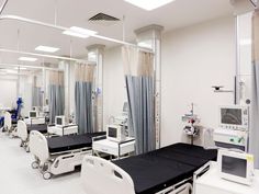 a hospital room filled with lots of medical equipment