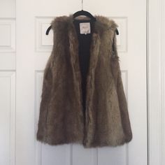 **Nwot** New Without Tags! Comfy And Warm Faux Fur Vest From Zara. Fur Is Veeeery Soft And Plush, And Has Hook Closures If You Prefer To Wear It Closed. Also Includes Extra Hooks. Selling Because I Only Wore Once And Has Been Sitting In My Closet Since :( Brown Faux Fur Outerwear For Spring, Spring Brown Faux Fur Outerwear, Faux Fur Vest, Faux Fur Vests, Zara Jackets, Fur Vest, Tan Brown, Faux Fur, Jackets & Coats