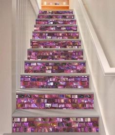 the stairs are decorated with colorful tiles