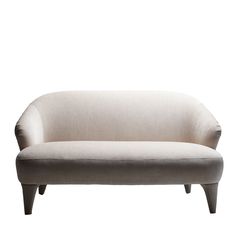 a white couch sitting on top of a wooden frame