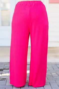 You know you need these beauties in your life! These pants in hot pink offer a flowy fit for both casual outings and comfortable lounging! The bold color adds versatility to any wardrobe! Expertly crafted and perfect for all-day wear! 67% Polyester, 25% Rayon, 8% Spandex Pink Wide Leg Loungewear Pants, Pink Wide Leg Pants With Elastic Waistband For Loungewear, Pink Wide Leg Pants For Loungewear, Chic Pink Wide Leg Loungewear Pants, Pink Straight Pants For Loungewear, Chic Pink Loungewear Pants, Casual Pink Wide Leg Pants For Loungewear, Pink Stretch Wide Leg Pants With Elastic Waistband, Trendy Pink Wide Leg Pants For Loungewear