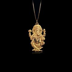 Elevate your spirit with our gold Ganesh pendant. Crafted in solid gold, this necklace beautifully captures the essence of the revered figure known for wisdom and prosperity. More than just an accessory, this pendant serves as a timeless symbol that resonates with those appreciating cultural heritage and meaningful connections. PENDANT INFORMATIONThis pendant is made of real, solid gold.• Made in USA• Material: 14k or 18k solid gold• Finish: polished• Height: 1.32" (33,5 mm) x Width: 0.8" (20 mm Spiritual Yellow Gold Jewelry For Festive Occasions, Festive Gold Amulet Jewelry, Ceremonial Spiritual Yellow Gold Temple Necklace, Spiritual Yellow Gold Necklace For Festive Season, Elegant Yellow Gold Temple Necklace For Rituals, Gold Plated Spiritual Jewelry For Puja, Yellow Gold Temple Jewelry Necklaces For Puja, 22k Gold Spiritual Temple Necklace For Diwali, Spiritual Gold Plated Jewelry For Puja