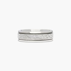 a white gold wedding band with hammered textured finish, set in 18k white gold