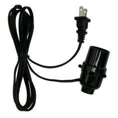 the black cord is plugged into an electrical outlet with two wires attached to it