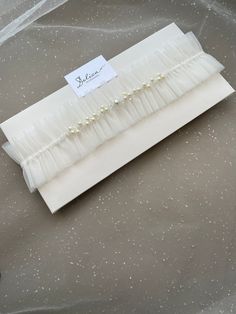 The garter is not only an unusual and interesting accessory, but also an opportunity to feel extremely special. The garter is made of delicate mesh and decorated with small pearls with transparent beads. Lovely and cute accessory that will compliment your bridal look! Upgrade shipping if you need the accessories in rush! https://www.etsy.com/listing/988957763/express-shipping-for-bridal-headpiece?ref=shop_home_active_6&frs=1 For USA and Canada citizens only, other countries have express ship Dream Wedding Dresses Simple, Wedding Garder, Pearls Wedding Theme, Unusual Wedding Dresses, Long Sleeve Bridal Dresses, Bride Garter, Garter Wedding, Leg Garter, Wedding Garters