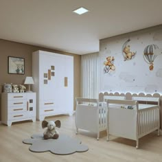 a baby's room with white furniture and decor