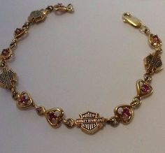 Harley Davidson 10K Gold , link garnet January heart bracelet .. My stone. Gold Link, Matching Necklaces, Heart Bracelet, Pretty Little Liars, 10k Gold, Diamond Bracelet, Birthstone, Garnet, Harley Davidson