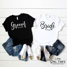 two t - shirts that say mr and mrs on them, one is black and the other is white