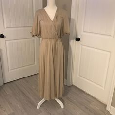 Stitchdrop Tan Maxi Size X-Small Wrap Style Top Portion Maxi Length Never Worn- Excellent Condition Tan In Color Materials In Pics Smoke Free Home Modest V-neck Maxi Dress For Day Out, Stretch V-neck Midi Dress For Daywear, Modest Fitted V-neck Maxi Dress, Casual Neutral V-neck Maxi Dress, Spring Beige Stretch Maxi Dress, Beige Stretch Maxi Dress For Spring, Beige V-neck Lined Midi Dress, Modest Beige V-neck Dress, Fitted V-neck Plain Midi Dress