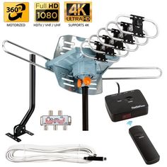 an image of a tv antenna with 4 antennas and remotes on the back ground