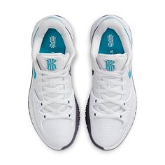 a pair of white sneakers with blue accents on the soles and upper part of the shoe