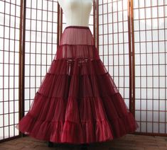 "The pictured petticoat was a custom order for a bride to wear underneath her vintage gown so that the deep garnet red will flash when she dances :) The idea is to have a lot of fullness at the hem of the skirt with no added fullness in the hip area. This sale is for a custom version of the pictured garnet red single layer petticoat made out of soft nylon chiffon. The waist will be .75\" (2cm) wide elastic that will be covered by satin charmeuse for comfort. Sizing is based on HIP circumference, Fitted Red Petticoat For Spring, Vintage Red Fitted Petticoat, Layered Gown, Garnet Red, Red Chiffon, Vintage Gowns, Chiffon Maxi, Polyester Satin, Flowy Skirt