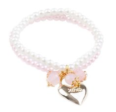 Perfect for the pearl lovers. This two strand bracelet has a gold locket shaped pendant with 'xoxo' engraved on it and bead dangles for a touch of fun. The bracelet easily closes with a classic toggle closure. Packaging Jewelry, Bead Dangles, Baby Bling, Backpack Lunch Bag, Copper Pearl, Gold Locket, Jewelry Card, Strand Bracelet, The Pearl