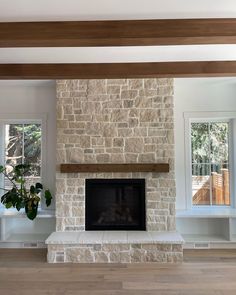 Creamy, beige, sandy stone fireplace in a living room using Casa Blanca RoughCut from Eldorado Stone available at I-XL Building Products. Rockwall With Fireplace, Stone Chimney Interior, Stone Tiled Fireplace, Farmhouse Stone Fireplace Ideas, Classic Stone Fireplace, Stone Fireplace With Bench Seating, Short Stone Fireplace, Stone Fireplace With Mantle And Tv, Stone Fireplace Small Living Room