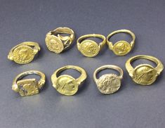 Lots of 8 pieces of vintage brass ring deferent size and deferent design most of the rings are coins shape All are copy from coins Greek roman and Kushan coins Gold Rings With Antique Finish, Vintage Brass Signet Ring As Gift, Vintage Brass Rings Tarnish Resistant, Vintage 14k Gold Coin Ring, Vintage Coin Shaped Signet Ring Gift, Antique Collectible Coin Rings, Ancient Gold Collectible Rings, Ring Vintage, Brass Ring