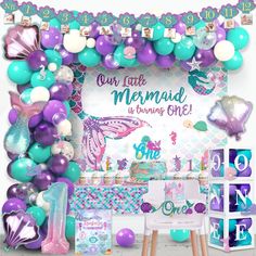 a mermaid themed birthday party with balloons and decorations