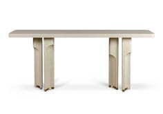 a white table with two gold legs and a long rectangular top, on a white background