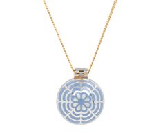 With its stunning, hand-painted design and cool toned color, this captivating Alice Cicolini necklace is a statement-making take on the traditional colored stone pendant. The round, sky blue aquamarine shimmers from the center of the 22K yellow gold bezel at the center of the sterling silver cupped pendant where it is framed in a gray lacquer design. The back of the pendant is painted with a blue geometric floral design and it hangs from the 14K yellow gold bale at the center of the 18K yellow g Alice Cicolini, Silver Tile, Aquamarine Blue, Aquamarine, Stone Pendants, Stone Color, Floral Design, Yellow Gold, Pendant Necklace