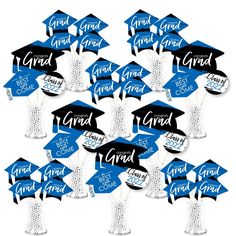 blue and black graduation cap shaped centerpieces with the words grad on them