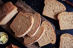 sliced bread and butter on a cutting board