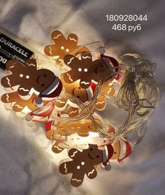 a bunch of christmas lights that are shaped like gingerbreads