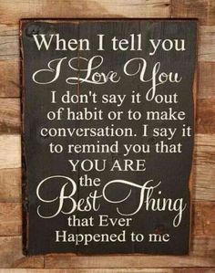 a wooden sign that says, when i tell you love you don't say it out