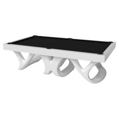 a white coffee table with black top