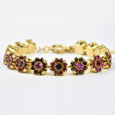 Fancy Flower Crystal Bracelet - Goldmakers Fine Jewelry Gold Ruby Bracelets For Party, Gold Ruby Bracelet For Party, Adjustable Red Crystal Bracelets, Adjustable Red Crystal Bracelet, Elegant Red Adjustable Crystal Bracelet, Formal Adjustable Ruby Bracelets, Adjustable Gold Ruby Bracelets, Adjustable Ruby Gold Bracelets, Elegant Adjustable Red Crystal Bracelet