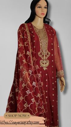 "Material: High-quality embroidered NET shirt and organza dupatta paired with silk trouser. Design: This boldly toned, net-embroidered suit is an ideal choice for your formal Eid evenings. It pairs beautifully with an elegant poly organza dupatta and classic raw silk pants. Occasion: Ideal for weddings, parties, or cultural events Includes: shirt and dupatta only Ready to wear, no hassle of stitching Comfortable and easy to move in Exquisite craftsmanship Care Instructions: Dry clean only for long-lasting beauty and durability. Note \"Please note that sizes may vary based on the specific style of the item.\" The color of the product in the photo might look slightly different in person due to factors like lighting and screen settings" Red Tulle Dress, Net Shirt, Silk Pant, Embroidered Suit, Trouser Design, Embroidered Dupatta, Pakistani Wedding Dresses, Silk Trousers, Rust Dress