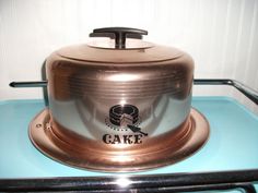 a large metal pot sitting on top of a stove