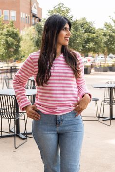 Pair it with tailored trousers for a polished office look, or team it with your favorite jeans and sneakers for a chic and relaxed ensemble. The "Pink Stripe Pullover Sweater" embodies the art of combining versatility and style, inviting you to embrace its timeless charm while expressing your personal fashion sense.Material: 60%Cotton35%Polyester5%SpandexFit: Relax Our Model Is Wearing: Small Casual Pink Tops For Work, Pink Everyday Tops For Fall, Pink Stretch Tops For Work, Stretch Pink Tops For Workwear, 70s Inspired Fashion, Office Look, 70s Inspired, Inspired Fashion, Tailored Trousers