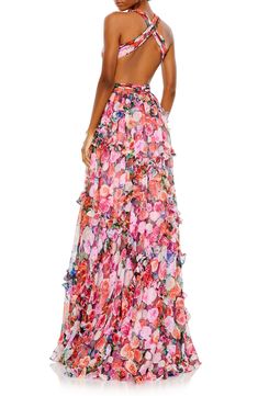 Romantic ruffles and blooming roses come together for runway-ready drama in this halter-style gown detailed with daring waist cutouts and an open back. 63" length Plunge neck Lined 100% polyester Spot clean Imported Asian Owned/Founded Cutout Gown, Mac Duggal Dresses, Exude Confidence, Pure Elegance, Chiffon Floral, Sleeveless Gown, Floral Print Chiffon, Floral Gown, Pleated Bodice