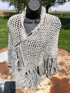 "Our shawls are one size fits all. Dress them up or dress them down. Wear to a wedding or wear with jeans. Many ways to style. This shawl was woven on a triangle loom using continuous strand weaving. Woven from yarn I purchased 98% Alpaca 2% Polyamide. 50\" tip to tip. 22\" high. Fringe adds 7\"." Bohemian Alpaca Shawl For Fall, One Size Woven Poncho Shawl, Bohemian Weaving Shawl For Fall, One Size Shawl Poncho With Fringe, Bohemian Weaving Scarf For Fall, Bohemian Alpaca Wrap For Fall, Bohemian Fall Shawl With Weaving, Bohemian Woven Shawl One Size, Traditional Fringe Shawl One Size