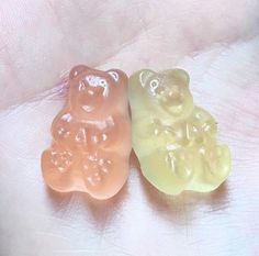 two gummy bears sitting next to each other