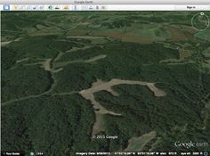 an aerial view of a wooded area in google earth