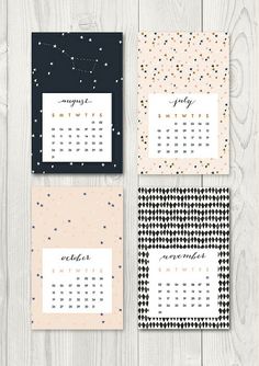 three calendars with black and white designs on them, one is for each month