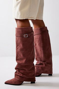 Stand out in these statement suede foldover boots, complete with flared overlays and buckle details for a pair that brings the drama. **Features:** Knee-high length, pull-on style, suede fabrication, slouchy flared overlay, buckle accent, pointed toe, chunky block heel **Why We | Felicity Foldover Boots by FP Collection at Free People in Brown, Size: US 8 Foldover Boots, Glamourous Heels, Crocs Boots, Rugged Boots, Knee Length Boots, Glitter Boots, Slouchy Boots, Chunky Block Heels, Buckle Boots