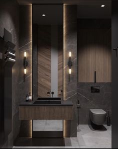 a bathroom with marble walls and dark fixtures