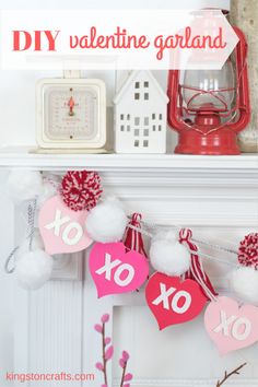 valentine's day garland hanging on the mantle