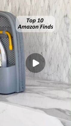 the top 10 amazon finds for kitchen gadgets and knives in a storage container on a marble countertop