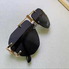 Avery Sunglasses In Noir Avery//Black Aviator Sunglasses/Uv Protected Lenses/Gold Frames/Uv400/Unisex// Measurements Temple Length: 140mm Lens Width: 55mm Height: 55mm Bridge Width: 15mm #Women #Men #Unisex #Goodvibes #Sunglasses Black Aviator Sunglasses For The Beach, Black Rimless Shield Sunglasses For Party, Black Aviator Sunglasses For Beach, Trendy Black Sunglasses With Metal Frame, Trendy Black Metal Frame Sunglasses, Chic Black Aviator Sunglasses For The Beach, Black Glass Shield Sunglasses For Beach, Beach Black Glass Shield Sunglasses, Black Aviator Sunglasses With Gradient Lenses For Vacation