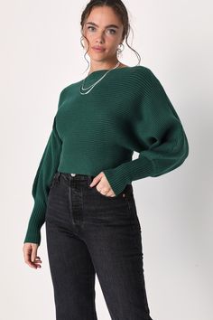 Keep your wardrobe stylish yet comfortable this winter season with a closet essential like the Lulus Classically Cozy Dark Green Ribbed Dolman Sleeve Cropped Sweater! This chic sweater is composed of stretchy midweight ribbed knit that shapes a pullover design and a boat neckline. Trendy dolman sleeves (with long fitted cuffs) frame the relaxed bodice that falls to a cute cropped hem. Fit: This garment fits true to size. Length: Size medium measures 16" from shoulder to hem. Bust: Great for any Slouchy Ribbed Sweater For Fall, Green Textured Knit Cropped Sweater For Winter, Green Ribbed Knit Top For Fall, Winter Ribbed Cropped Sweater, Cozy Sweater With Batwing Sleeves And Ribbed Cuffs, Winter Batwing Sleeve Sweater With Ribbed Cuffs, Winter Sweater With Ribbed Cuffs And Batwing Sleeve, Slouchy Long Sleeve Cropped Sweater For Winter, Slouchy Cropped Sweater For Winter