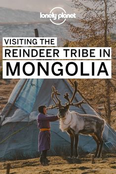 a man standing next to a reindeer in front of a tent with the words visiting the reindeer tribe in monogola