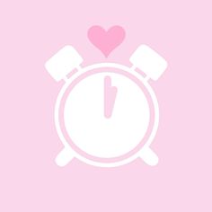 an alarm clock with a pink heart on it's face and the word i love you