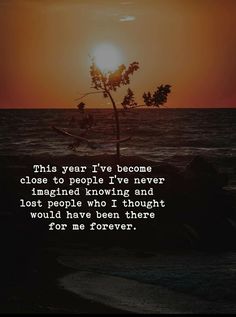 the sun is setting over the ocean with a poem written on it that reads, this year iv've become close to people i've never