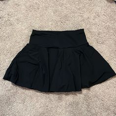 Brand New Black Tennis/Golf Skirt With Built-In Shorts, Pocket On Both Sides Under Skirt Hidden In Shorts For Phone, Money, Etc. Never Worn, Smoke Free Home Black Pleated Tennis Skirt With Short Inseam, Relaxed Mini Skort With Wide Waistband, Solid Skort With Wide Waistband, Flowy Mini Skort With Wide Waistband, Black Mini Skirt With Wide Waistband, Black Tennis Skirt With Short Inseam And Lining, Black Pleated Skort With Short Inseam, Black Pleated Short Inseam Skort, Stretch Flared Skort With Built-in Shorts