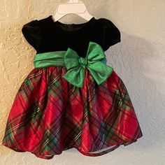 Red , Green And Black Christmas Dress With Bloomers. Velvet Black Bodice And Silky Satin Plaid Bottom. Black Christmas Dress For Festive Occasions, Black Christmas Festive Dress, Cute Christmas Playtime Dress, Festive Holiday Dress With Short Sleeves, Festive Short Sleeve Holiday Dress, Cute Christmas Playtime Dresses, Red Christmas Playtime Dress, Festive Short Sleeve Holiday Dress For Christmas, Red Short Sleeve Holiday Dress