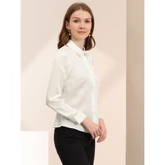 The long-sleeve fit of this shirt flatters most body types and provides enough coverage for a modest yet stylish look. The button-up front of this shirt makes it easy to wear and provides a timeless and classic look that never goes out of style. This shirt can be paired with dress pants or skirts for a formal workwear look, or dressed down with jeans or shorts for a more casual yet polished outfit. Sleek Button-up Office Shirt, Sleek Button-up Blouse For Business, Elegant Stretch Button-up Shirt, White Formal Button-up Tops, Slim Fit Professional Button-up Dress Shirt, Womens Office, Satin Shirt, Satin Top, Shop Blouses