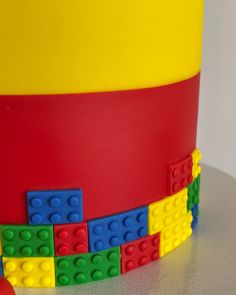 there is a lego hat made out of legos and plastic bricks on the table